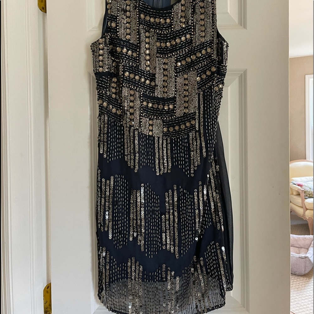 Sequined mini dress, by Gracie. Née with the tags, never worn!